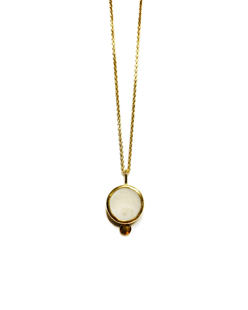 shiva shell (operculum) necklace in gold