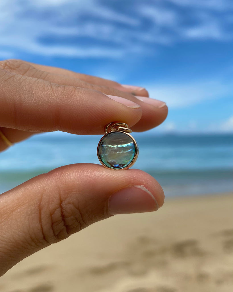 abalone sun wrapped in gold