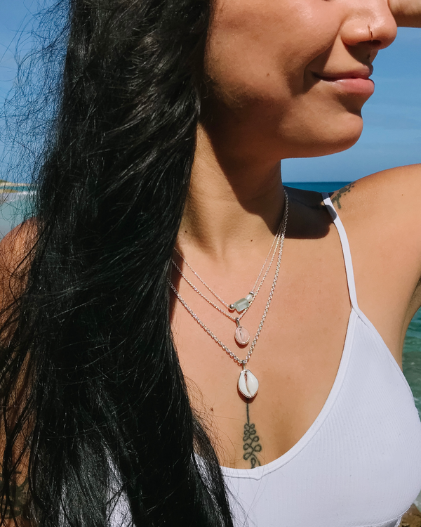 cowrie + trivia shell necklaces in silver